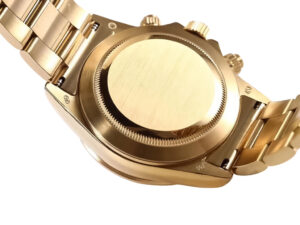 Back view of the Cosmograph Daytona Yellow Gold ‘Rainbow’ watch showcasing its polished gold case and bracelet.