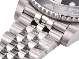 Close-up view of the GMT-Master II Stainless Steel ‘Sprite’ on Jubilee bracelet, showcasing polished links and bezel edge.