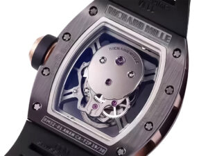 Back view of RM 52-01 watch showcasing its mechanical tourbillon movement, black rubber strap, and rose gold accents.