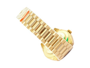 Day-Date 40 Yellow Gold ‘President’ watch with fluted bezel and black motif dial, showcasing the gold bracelet.