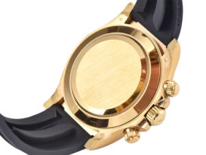 Back view of Cosmograph Daytona Yellow Gold Oysterflex with gold case, black rubber strap, and detailed crown features.