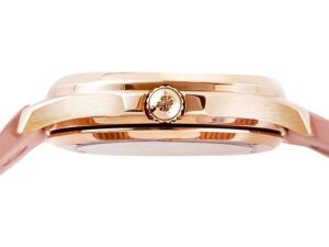 Side view of the Aquanaut Luce Haute Joaillerie Rose Gold Diamond Pink watch, its rose gold case and crown detailing.