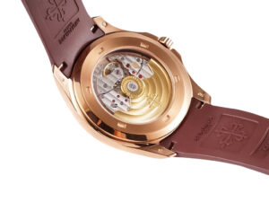 Back view of the Aquanaut Rose Gold with Chocolate Dial (40mm), showcasing its open caseback and intricate movement.