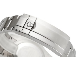 Close-up of the clasp on the Submariner Date Stainless Steel 'Starbucks' (41mm), showcasing the iconic crown logo.