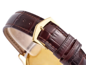 Close-up of the brown leather strap with a yellow gold buckle on the Calatrava Yellow Gold with Ivory Dial (39mm) watch.