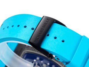 Close-up of the blue rubber strap with a black "Richard Mille" buckle, part of the RM055 Bubba Watson watch.