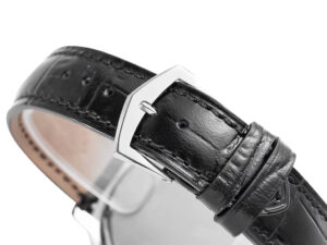 Close-up image of a black leather strap with a stainless steel buckle, part of the Calatrava Stainless Steel (39mm) watch.
