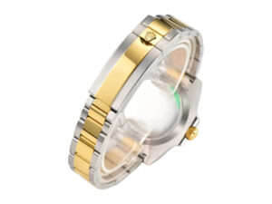 Two-tone yellow gold and stainless steel bracelet with a signature crown clasp, showcasing design for the Submariner Date.