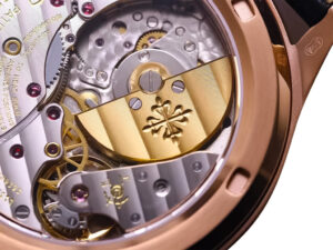 Close-up view of rose gold movement and intricate mechanisms of the Celestial Only Watch, showcasing craftsmanship details.