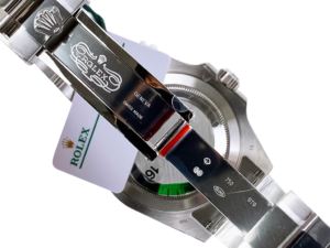 Close-up of the clasp and caseback of the Submariner Date Stainless Steel ‘Cookie Monster’ (41mm), showing Rolex branding.