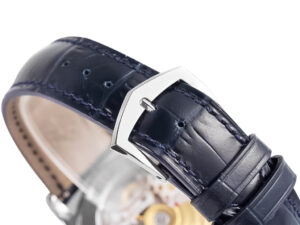 Close-up of the navy blue leather strap and stainless steel buckle of Calatrava Stainless Steel with Ivory Dial (38mm) watch.