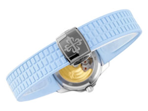 Aquanaut Luce Stainless Steel Diamond Blue watch showcasing an intricate clasp design and light blue textured strap.