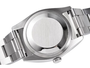 Stainless steel case back of the Oyster Perpetual 36 watch, showcasing brushed metal finish and part of the bracelet.