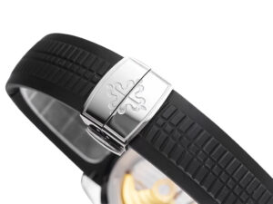 Close-up of the Aquanaut Stainless Steel watch clasp with black textured strap and visible logo engraving.
