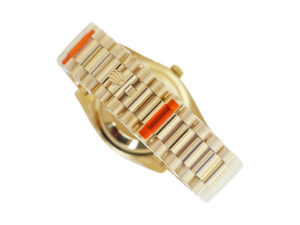 Day-Date 36 Stainless Steel 'President' watch with silver dial, diamond bezel, and gold bracelet shown from the back.