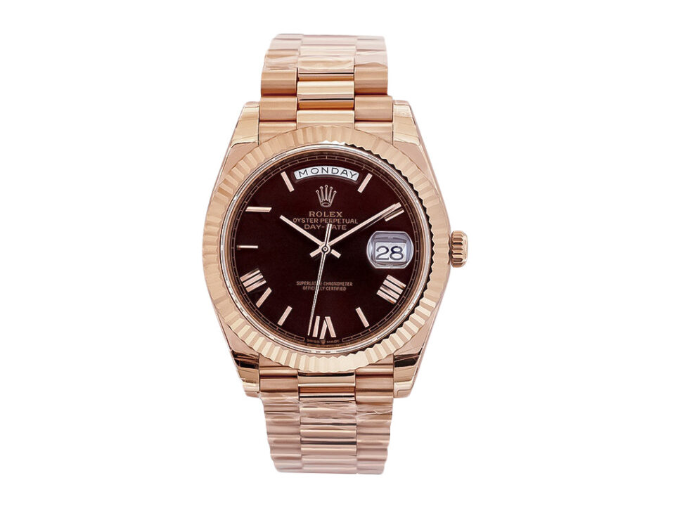 Day-Date 40 Rose Gold 'President' watch with chocolate dial, Roman numerals, and fluted bezel displayed on a product page.