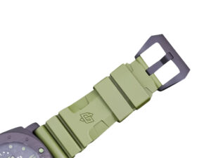 Close-up of the Luminor Submersible 47 Marina Militare Carbotech watch showing its green strap and forged carbon bezel.