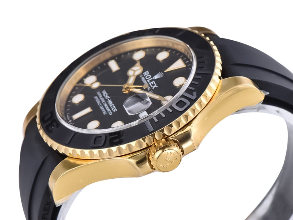 Yacht-Master Yellow Gold (42mm) with Oysterflex strap, black dial, and gold case, showcasing elegant craftsmanship.