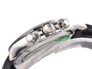 Side view of the Cosmograph Daytona White Gold Oysterflex with crown and pushers, showcasing its sleek white racing dial design.
