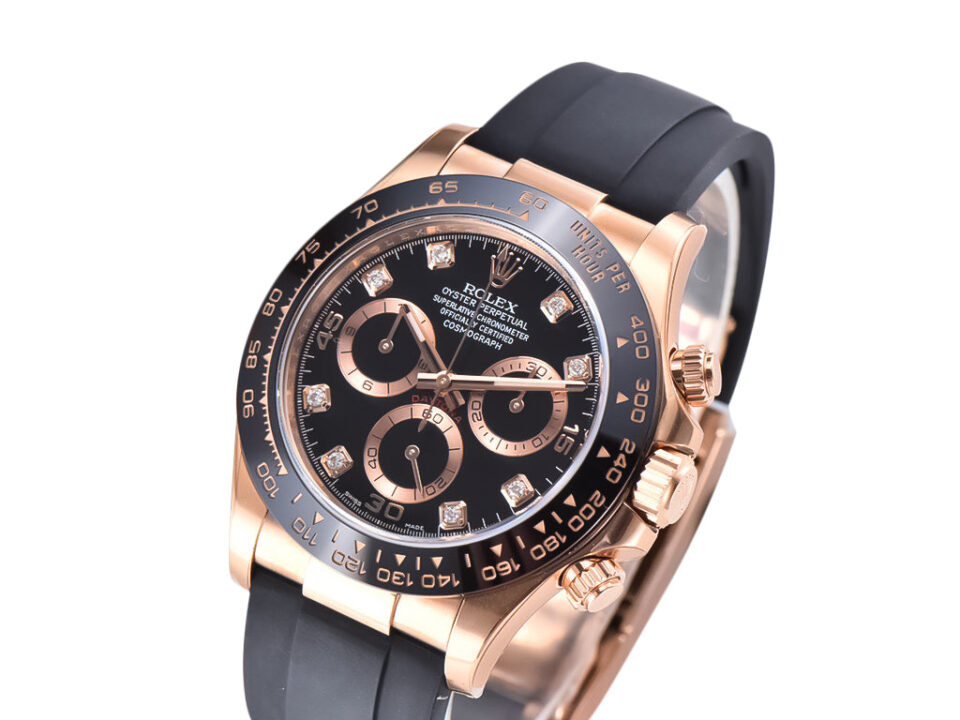 Cosmograph Daytona Rose Gold Oysterflex with Black Dial, featuring a sleek design and luminous accents on the bezel and face.