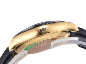Side view of the Cosmograph Daytona Yellow Gold Oysterflex watch showcasing its gold case and black strap.