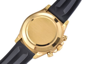 Back view of the Cosmograph Daytona Yellow Gold Oysterflex watch, showcasing its polished gold case and black rubber strap.
