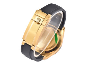 Yellow gold clasp with Rolex crown emblem on a black Oysterflex strap, part of the Cosmograph Daytona Yellow Gold model.