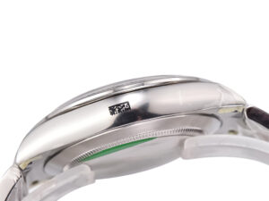 Side view of the Cosmograph Daytona Stainless Steel watch showcasing its polished case and intricate detailing.