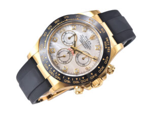 Cosmograph Daytona Yellow Gold watch with White Mother of Pearl dial, black Oysterflex strap, and gold accents.