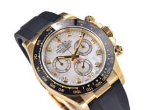 Cosmograph Daytona Yellow Gold with Oysterflex strap, White Mother of Pearl Dial, diamond hour markers, and black bezel.