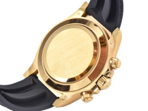 Back view of Cosmograph Daytona Yellow Gold Oysterflex showing gold case, screw-down push buttons, and black rubber strap.