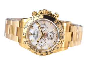 Cosmograph Daytona watch in yellow gold with white mother of pearl dial, featuring an Oysterflex bracelet and chronograph.