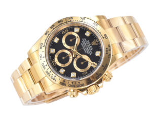 Alt text: Cosmograph Daytona Yellow Gold watch with a black dial and diamond hour markers, featuring a gold bracelet.