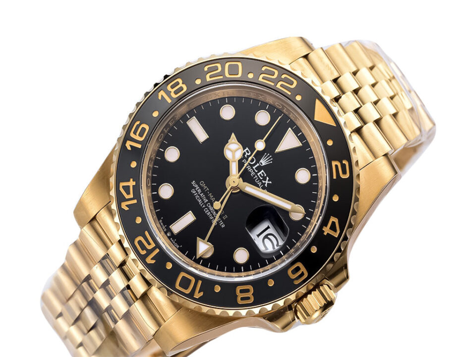 GMT-Master II Yellow Gold with Black Dial on Jubilee bracelet, 40mm size, showcasing its luxurious design and time markings.