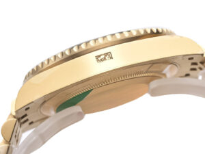 Side view of the GMT-Master II Yellow Gold Black Dial on Jubilee bracelet, showcasing its sleek 40mm case and detailed edges.