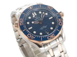 Seamaster Diver 300 Two Tone Rose Gold with Blue Dial (42mm), featuring a stainless steel and rose gold bracelet.
