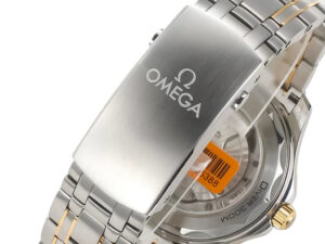 Close-up of the Seamaster Diver 300 Two Tone (42mm) showcasing the stainless steel and gold bracelet with engraved logo.