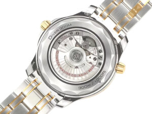 Case back view of the Seamaster Diver 300 Two Tone with Black Dial (42mm), showcasing the intricate co-axial movement.