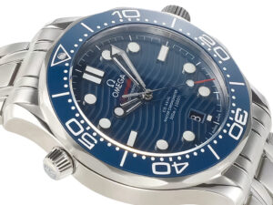 Seamaster Diver 300 Stainless Steel with blue dial, 42mm, featuring a wave pattern and luminous markers on a steel bracelet.