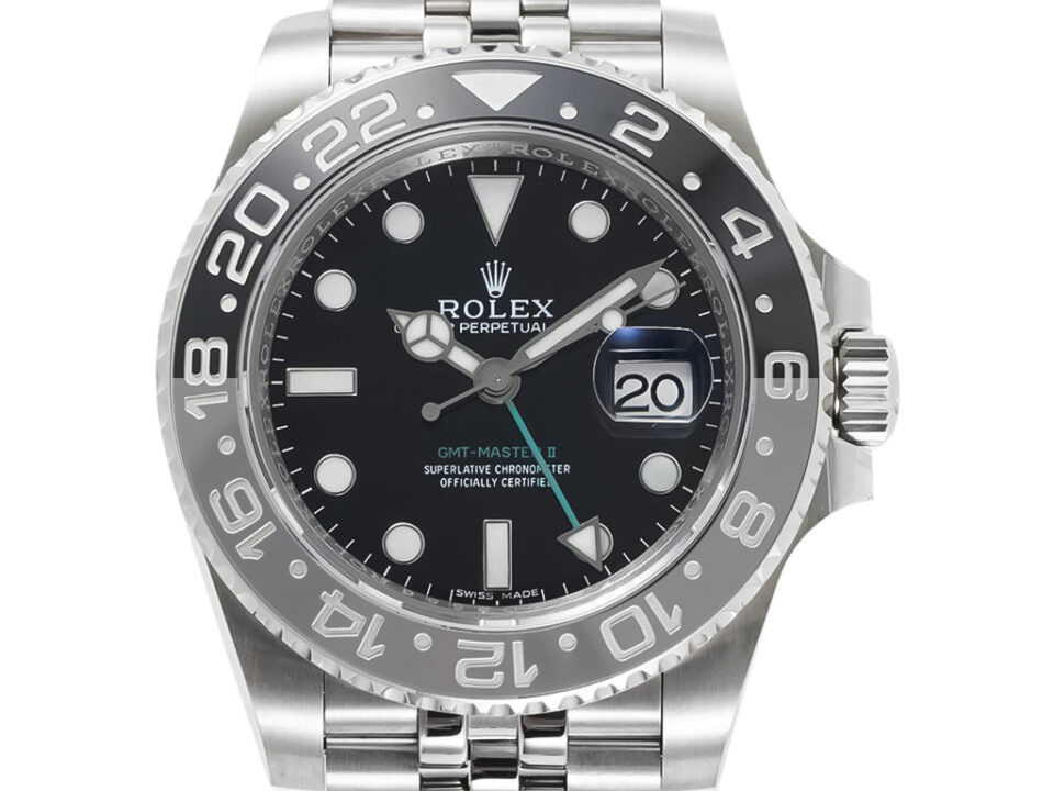 GMT-Master II 'Bruce Wayne' on Jubilee (40mm) with stainless steel case, black dial, blue and black bezel, and date display.