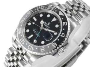 GMT-Master II Stainless Steel 'Bruce Wayne' on Jubilee (40mm) with black dial, green 24-hour hand, and bi-color bezel.