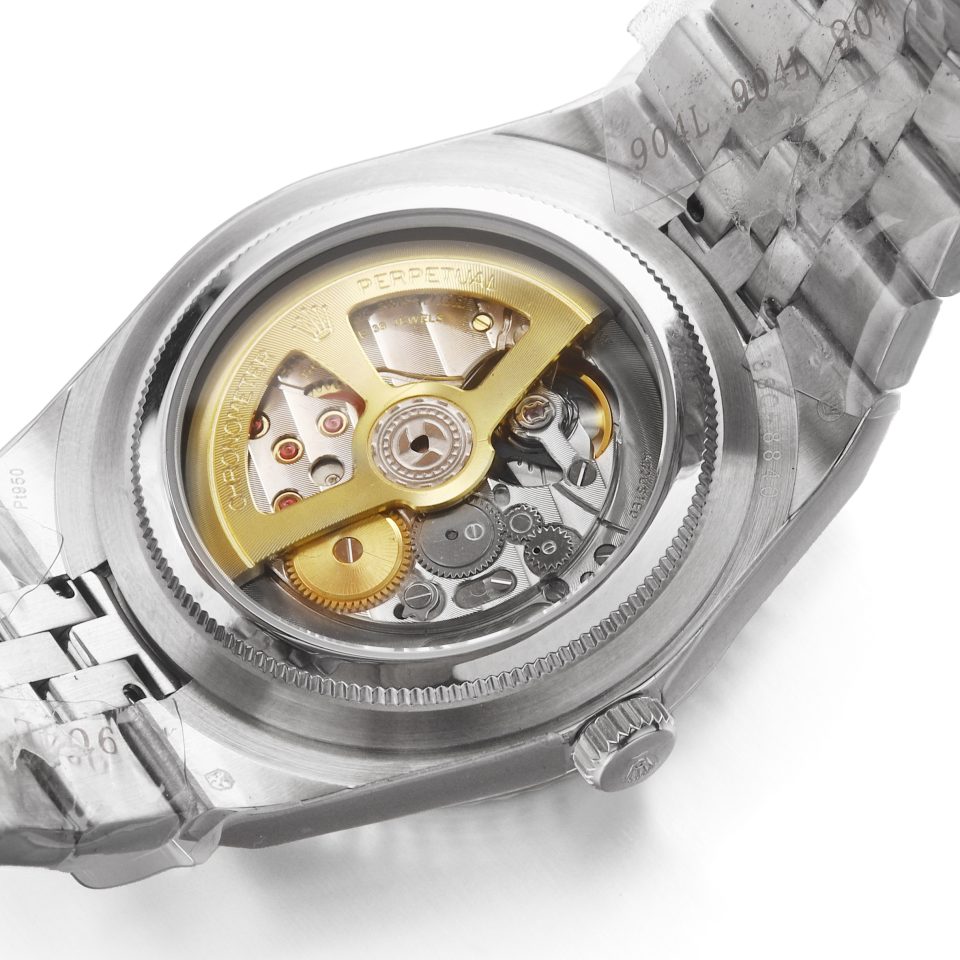 Close-up of Land Dweller 40 Platinum Ice Blue Dial watch movement, showcasing luxury watch craftsmanship.