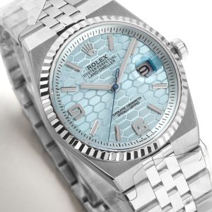 Luxury watches Land Dweller 40 Platinum Ice Blue Dial Flat Jubilee with hexagonal patterned face and silver bracelet.