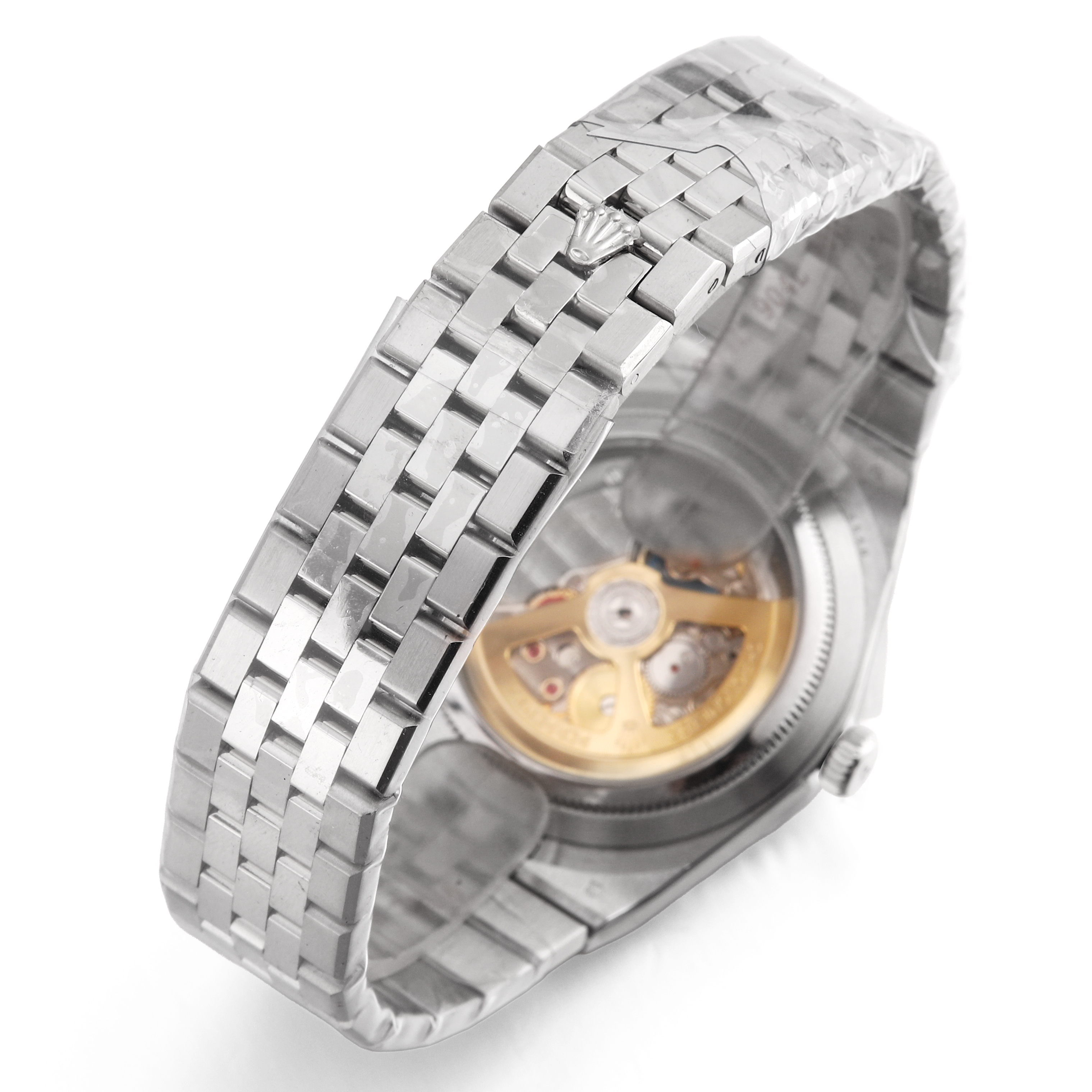 Luxury watches watches Land Dweller 40 Platinum Ice Blue Dial with flat jubilee bracelet, close-up of case back.