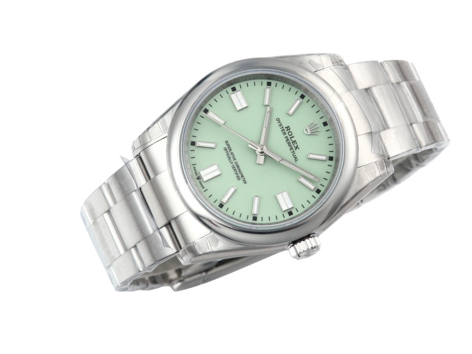 Oyster Perpetual 36 Stainless Steel watch with pistachio dial, displayed at an angle on a white background.