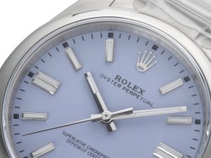 Close-up of Oyster Perpetual 41 Stainless Steel with lavender dial, featuring silver hour markers and hands.