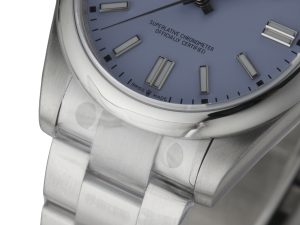 Close-up of Oyster Perpetual 41 Stainless Steel watch with a lavender dial, showing bracelet and indices.