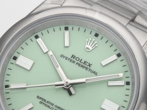 Oyster Perpetual 36 Stainless Steel with pistachio dial, close-up of watch face and hands.